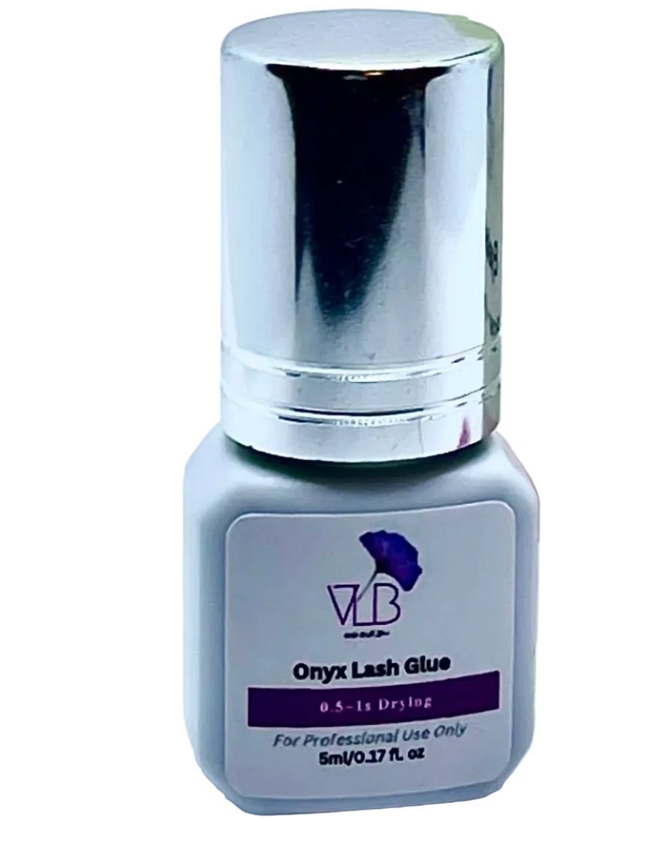 A small bottle of eye lash glue and a dropper bottle of eyelash primer and binder, both branded VP Beauty, with a pink heart-shaped tool on a light gray background.